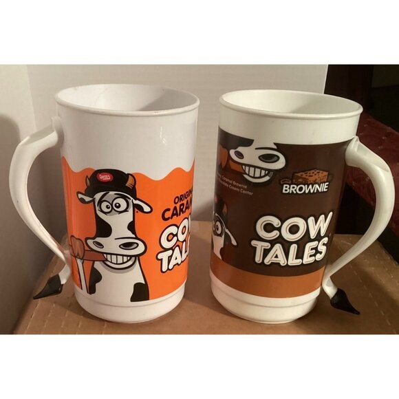Cow Tales 2-Piece Mug Set Original Caramel & Brownie Designs 7" Tall Plastic Whi - Picture 2 of 4